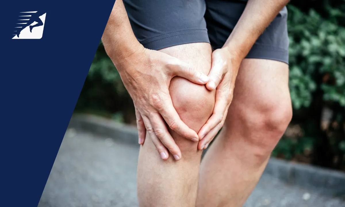 Ein Läufer greift sich auf seinen Meniskus