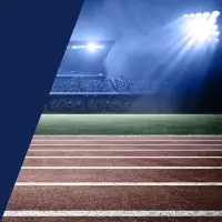 Leichtathletik-Laufbahn in einem Stadion mit Beleuchtung