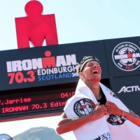 France&#039;s Yvann Jarrige is unable to hide his joy at winning his first IRONMAN 70.3 title. Huw Fairclough for IRONMAN