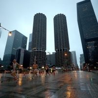 SKYSCRAPER SKYLINE: Despite the wet conditions, runners were treated to a 13.1-mile tour of Chicago&#039;s famous architecture including the iconic Marina Towers (Photo credit Ronald Martinez/Getty Images for Rock &#039;n&#039; Roll Marathon Series