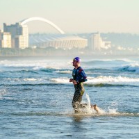 Athlete comes out the swim in the beautiful city of Durban during the 2019 IRONMAN 70.3 Durban (Chris Hitchcock for IRONMAN)