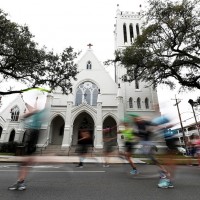 Runners fly past the historic Christ Church Cathedral located on the iconic St. Charles Avenue one of the many well-know New Orleans neighborhoods they pass through during the 2019 Humana Rock &#039;n&#039; Roll New Orleans Marathon &amp; ½ Marathon (Photo Credit: Jona