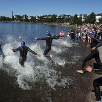 A unique afternoon swim start experience for IRONMAN 70.3 Finland, giving athletes the perfect opportunity to race under the midnight sun. Getty Images for IRONMAN